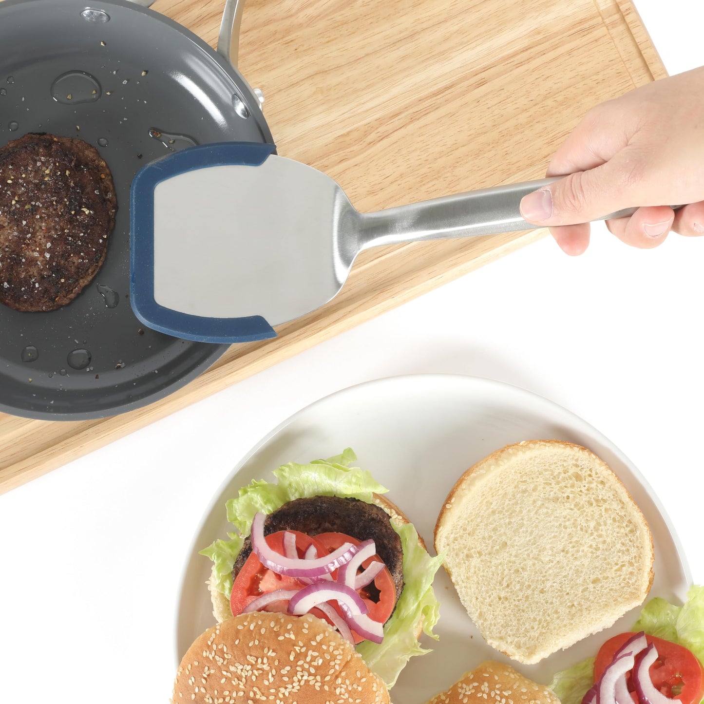 Calphalon Prime Stainless Steel Turner with Navy Blue Silicone Rim, Slotted Spatula, Heat-Resistant, Durable Kitchen Tool for Cooking and Serving